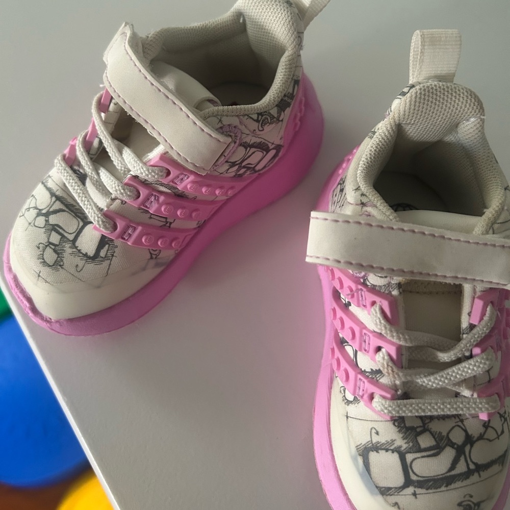 Adidas’s Lego sneakers, size 4K which is for a 12-15 month old baby.